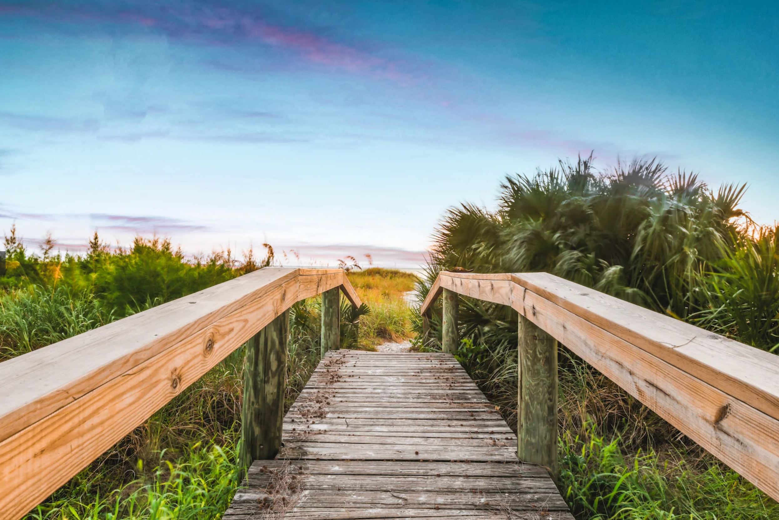 walkway to the beach on Anna Maria Island. book one of our many luxurious Anna Maria Island rentals within walking distance to the beach.